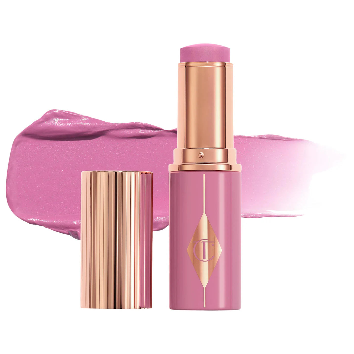 شارلوت تلبري Unreal Lip + Cheek Glow Blush Stick مع حمض الهيالورونيك