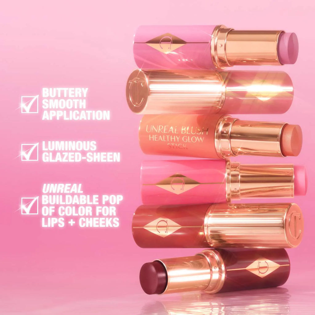شارلوت تلبري Unreal Lip + Cheek Glow Blush Stick مع حمض الهيالورونيك